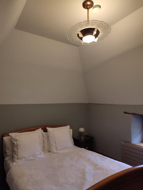 Postel nebo postele na pokoji v ubytování Gite, chambre d hôte L échoppe est belle