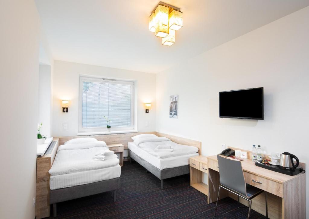 
Family Suite (2 Adults + 2 Children)
