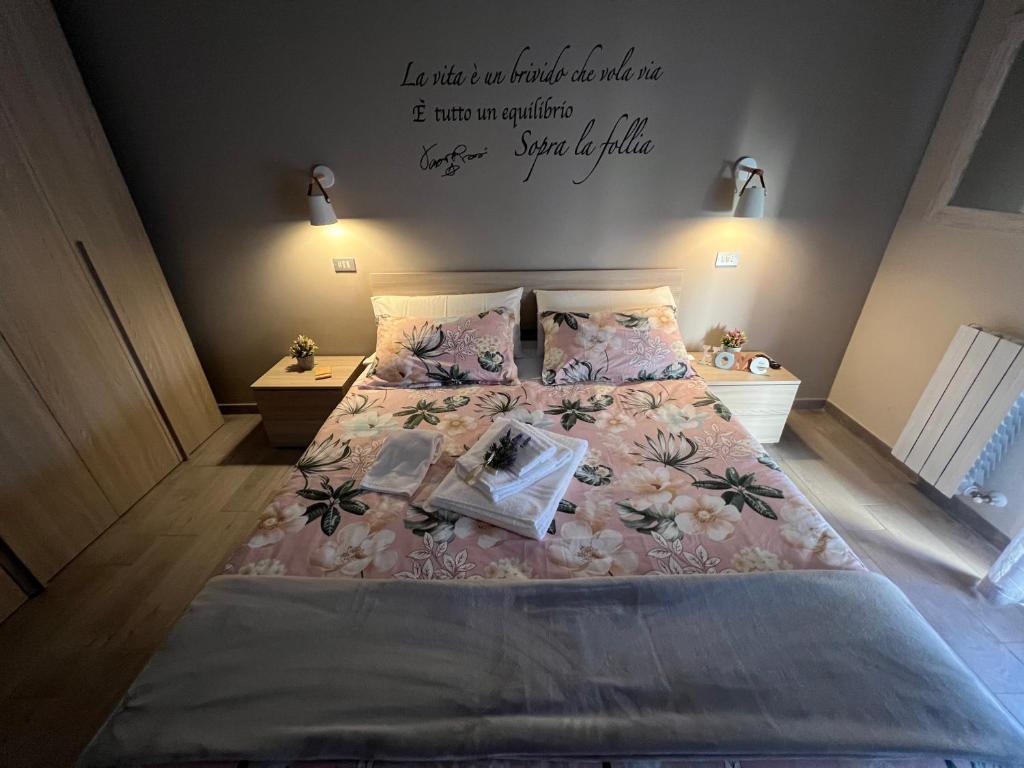 Ένα ή περισσότερα κρεβάτια σε δωμάτιο στο Casa vacanze “Dolce sosta”