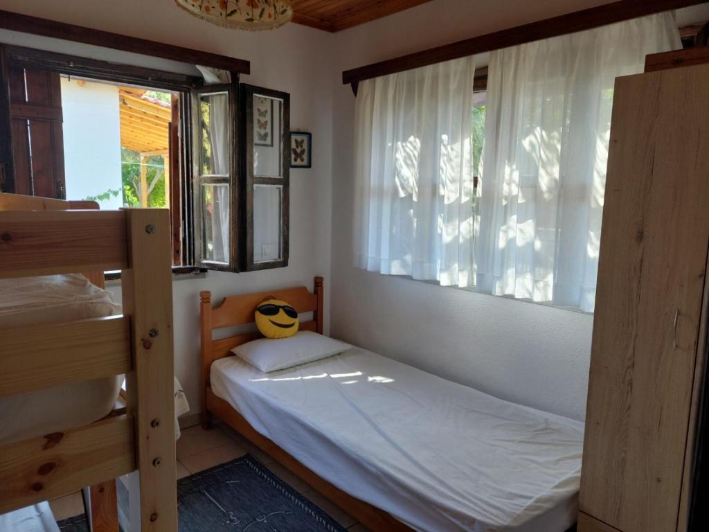 Postel nebo postele na pokoji v ubytování Villa Achilleas