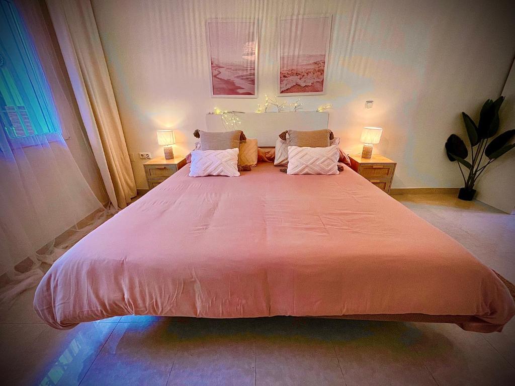 Posteľ alebo postele v izbe v ubytovaní Apartamento en Monte Gibralfaro piscina compartida