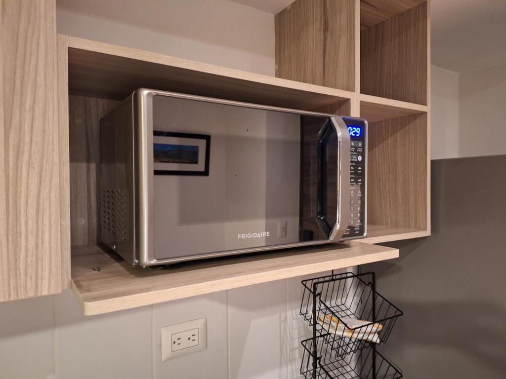 O bucătărie sau chicinetă la In The Heart of the City Zone 4