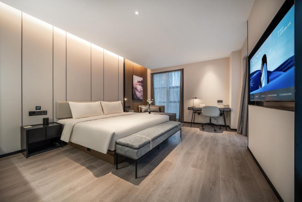 Postel nebo postele na pokoji v ubytování Atour Hotel Dazhou Quxian Wealth Center