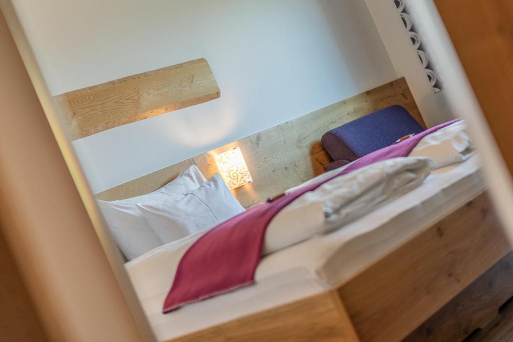 Postel nebo postele na pokoji v ubytování Hotel Winterer