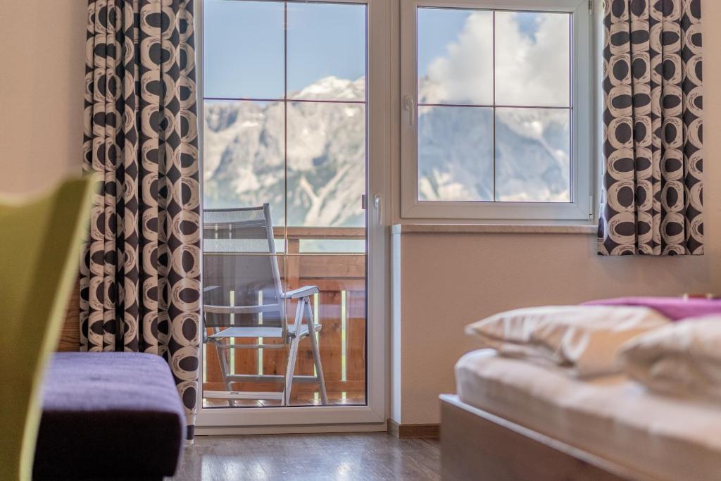 Postel nebo postele na pokoji v ubytování Hotel Winterer