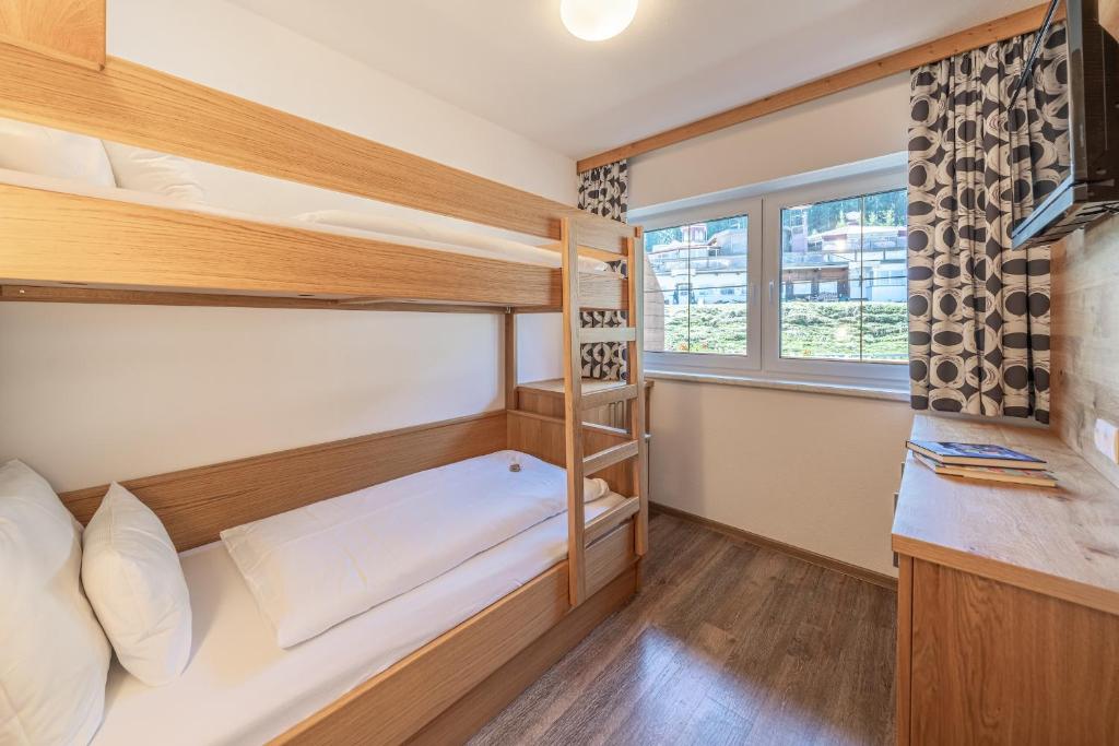 Postel nebo postele na pokoji v ubytování Hotel Winterer