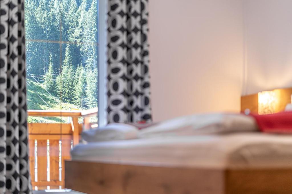 Postel nebo postele na pokoji v ubytování Hotel Winterer