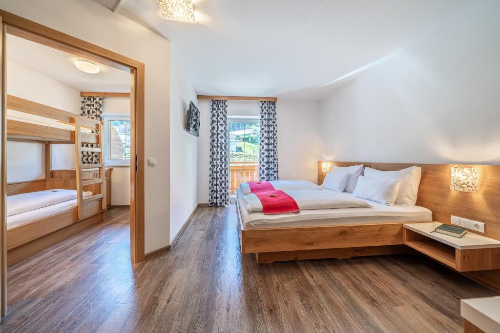 Postel nebo postele na pokoji v ubytování Hotel Winterer
