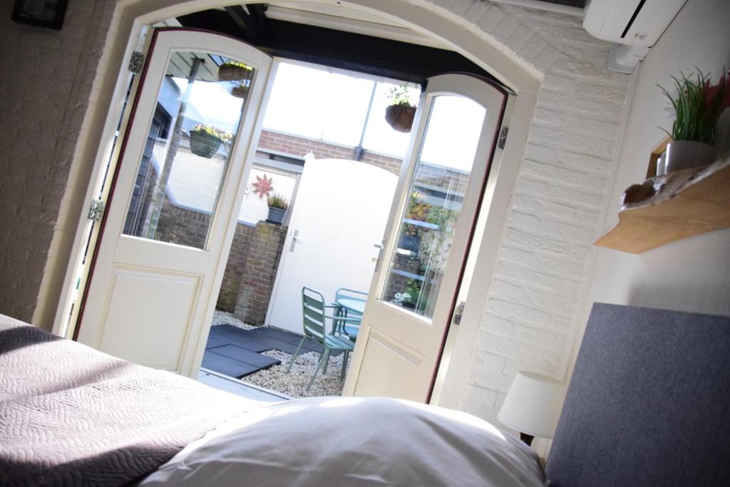Postel nebo postele na pokoji v ubytování B&B CaSandra