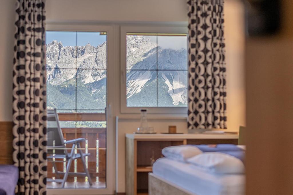 Postel nebo postele na pokoji v ubytování Hotel Winterer