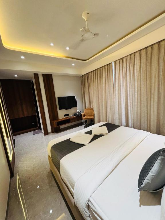 Postel nebo postele na pokoji v ubytování Hotel Royal Retreat