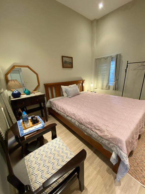 Postel nebo postele na pokoji v ubytování Quynh Nest Homestay