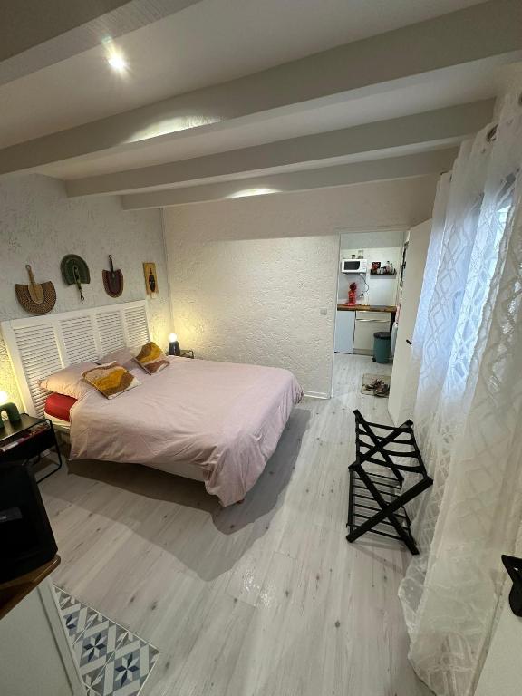 Un ou plusieurs lits dans un hébergement de l'établissement Timounyan T1 N23 centre ville Animaux acceptés