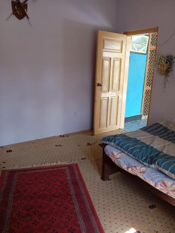 Voodi või voodid majutusasutuse Stay in Skardu toas