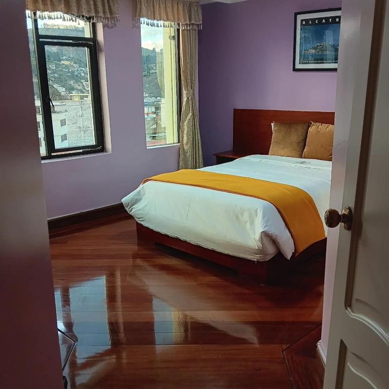 Postel nebo postele na pokoji v ubytování HOTEL MADURAI