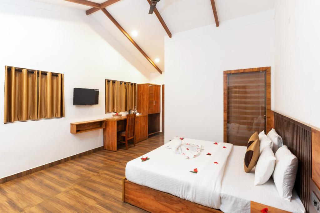 Postel nebo postele na pokoji v ubytování Tealawn Pool Villa, Munnar