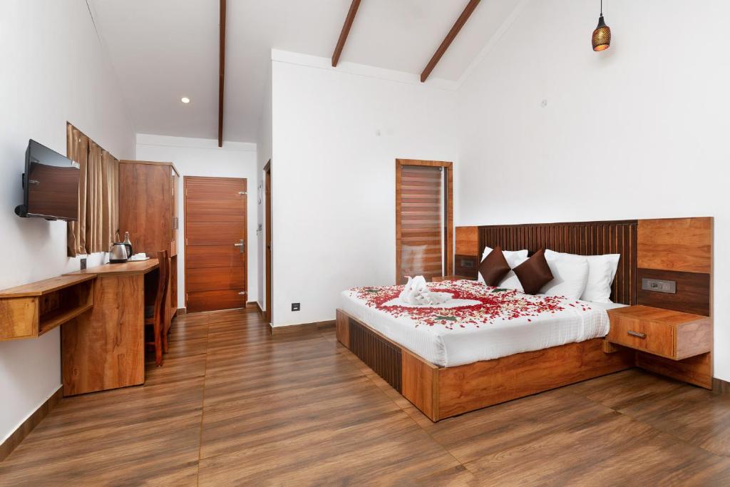 Postel nebo postele na pokoji v ubytování Tealawn Pool Villa, Munnar