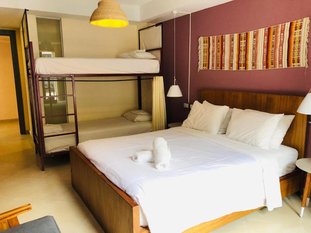 Postel nebo postele na pokoji v ubytování Hotel Brio Centro