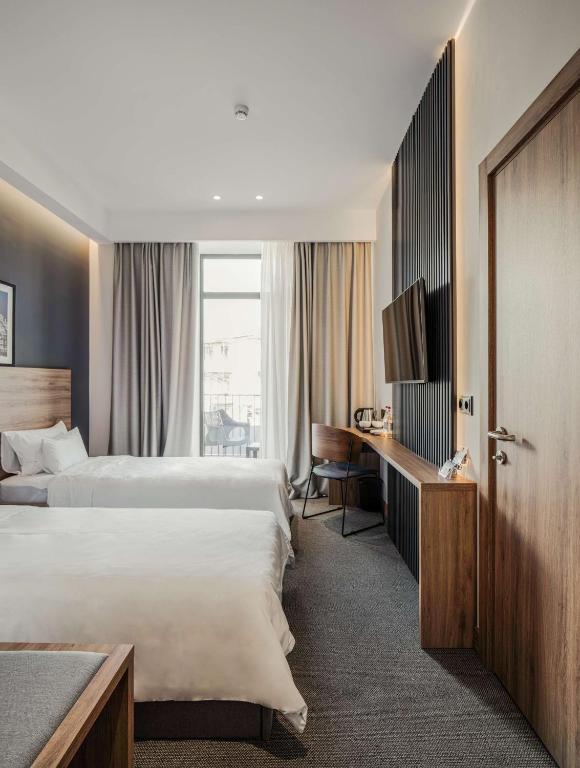 Postel nebo postele na pokoji v ubytování Radisson Hotel & Spa Gyumri