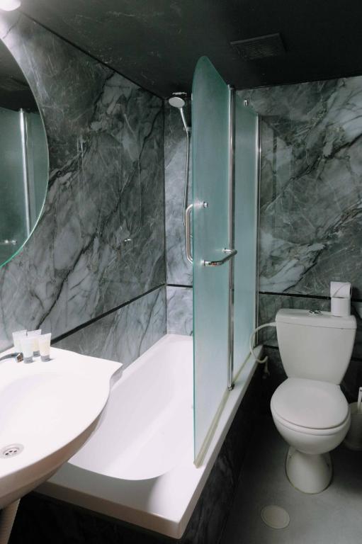Koupelna v ubytování Rich Boutique Hotel
