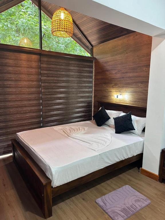 Postel nebo postele na pokoji v ubytování Singhagiri Haven Sigiriya