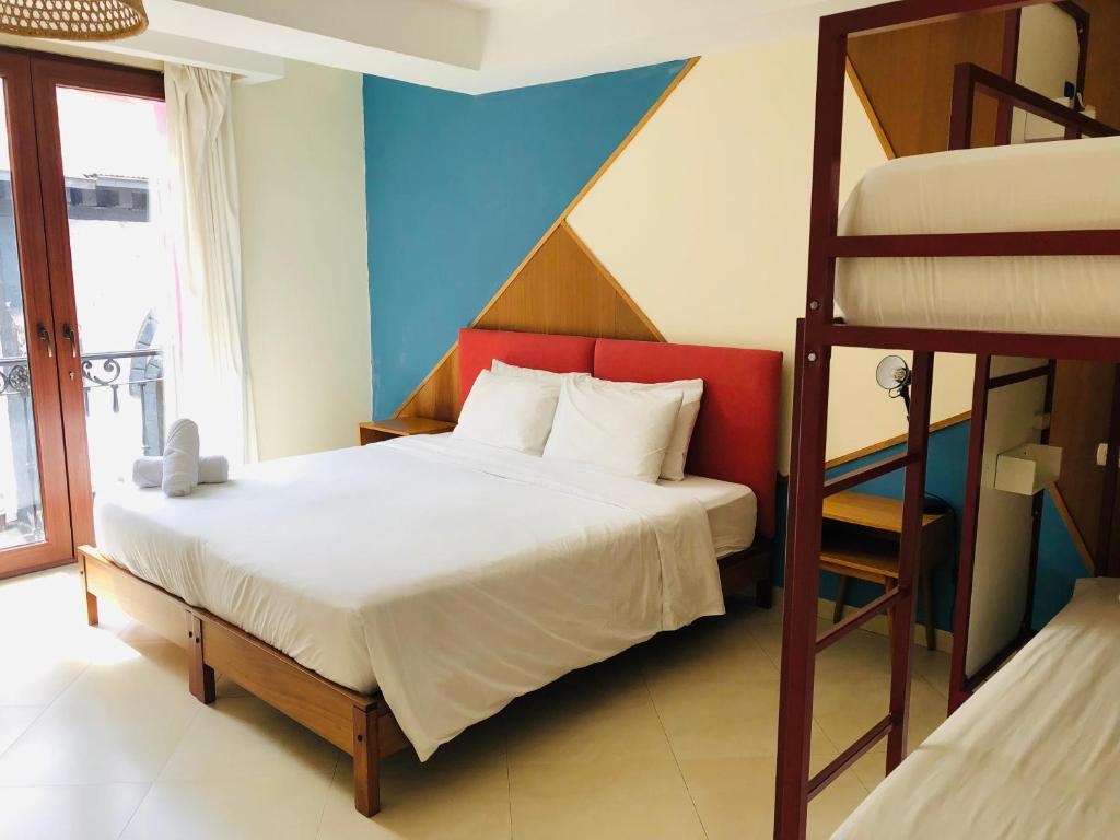 Postel nebo postele na pokoji v ubytování Hotel Brio Centro