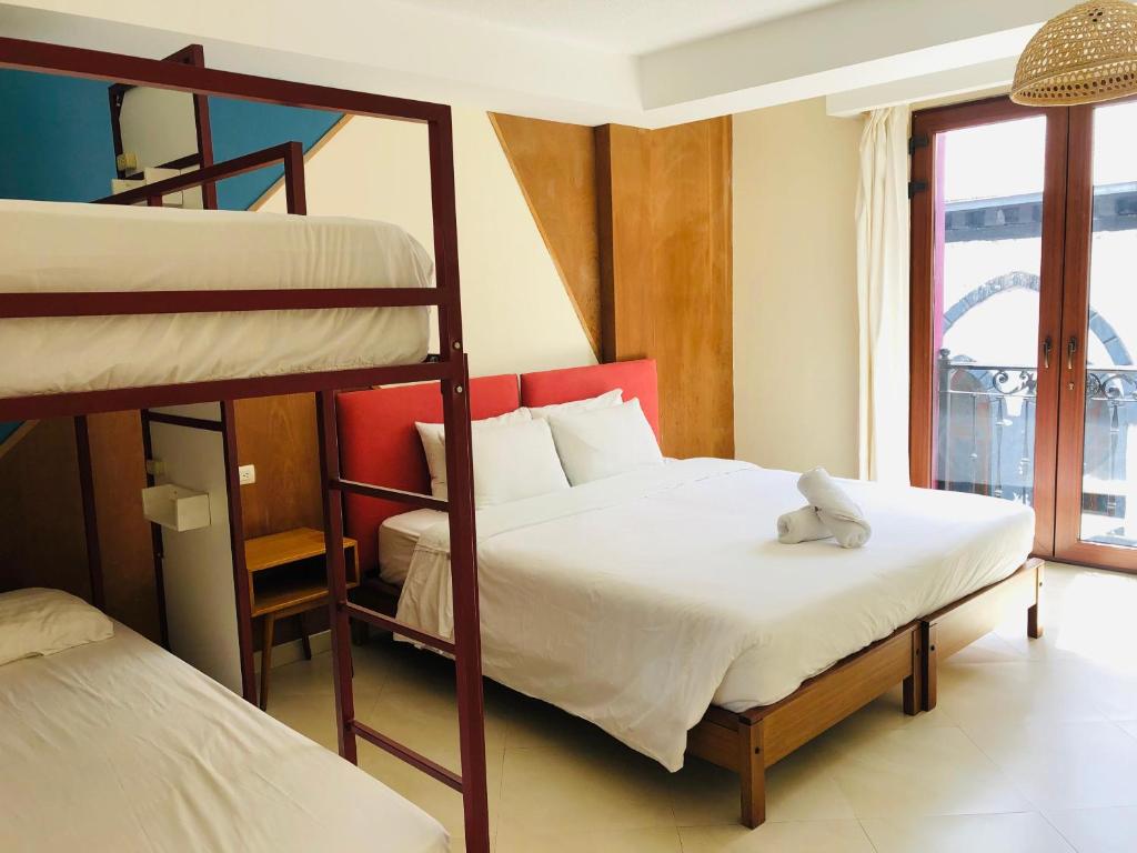 Postel nebo postele na pokoji v ubytování Hotel Brio Centro