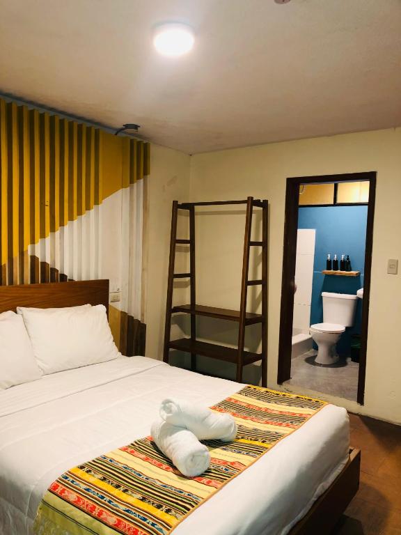 Postel nebo postele na pokoji v ubytování Hotel Brio Centro