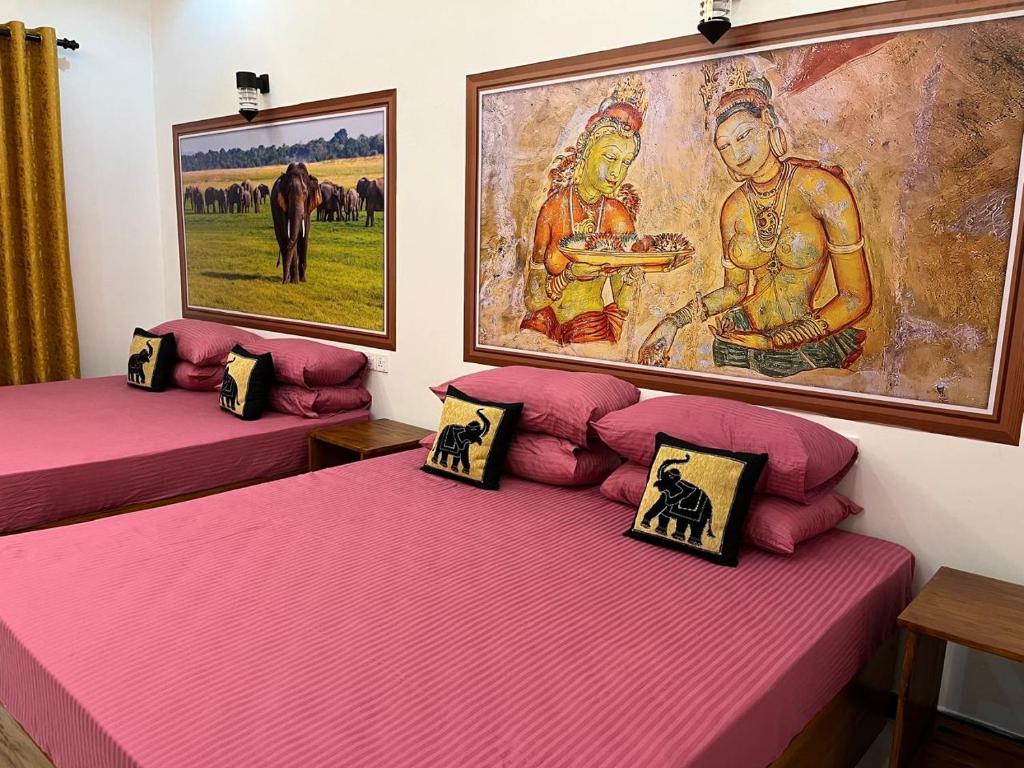 Postel nebo postele na pokoji v ubytování Hotel Gala Addara