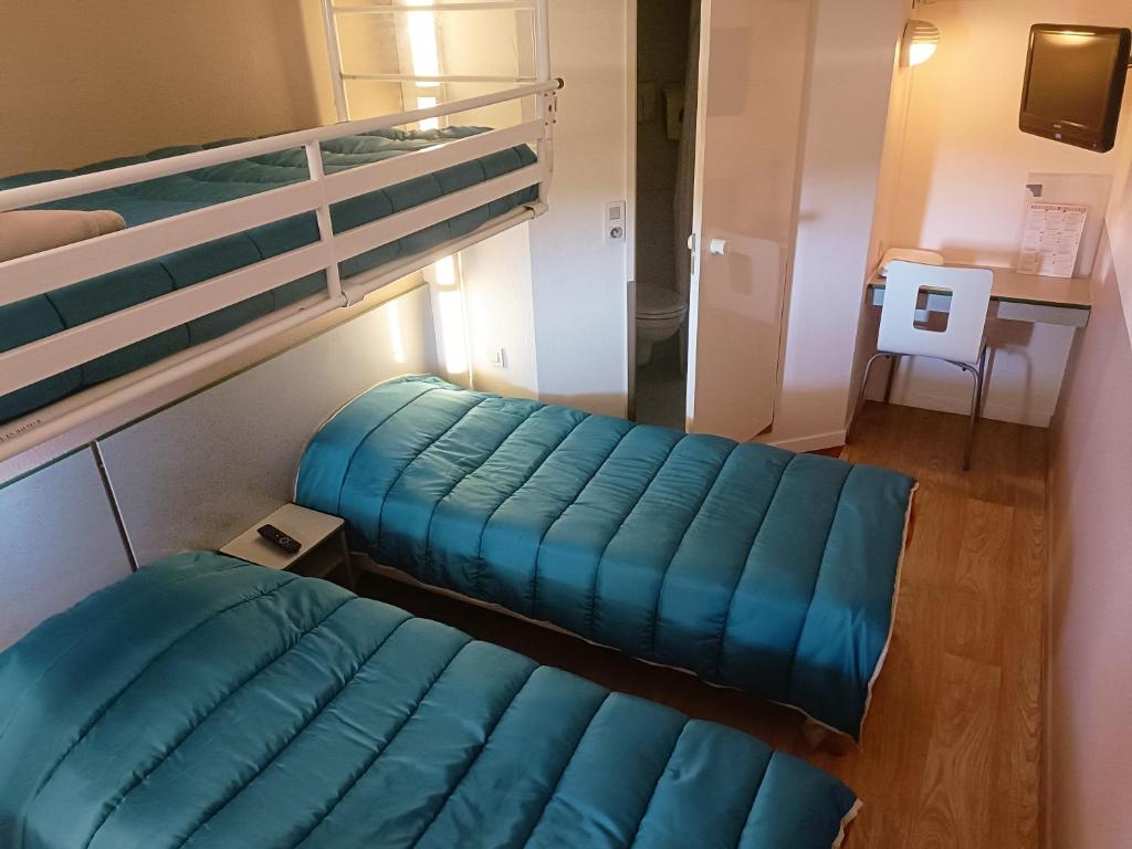 Kuchyň nebo kuchyňský kout v ubytování FASTHOTEL Reims Est - Taissy