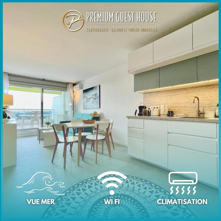une cuisine et une salle à manger avec une table dans l'établissement PGH N25 - Vue Mer, Première Ligne & Parking Privé, à La Grande Motte