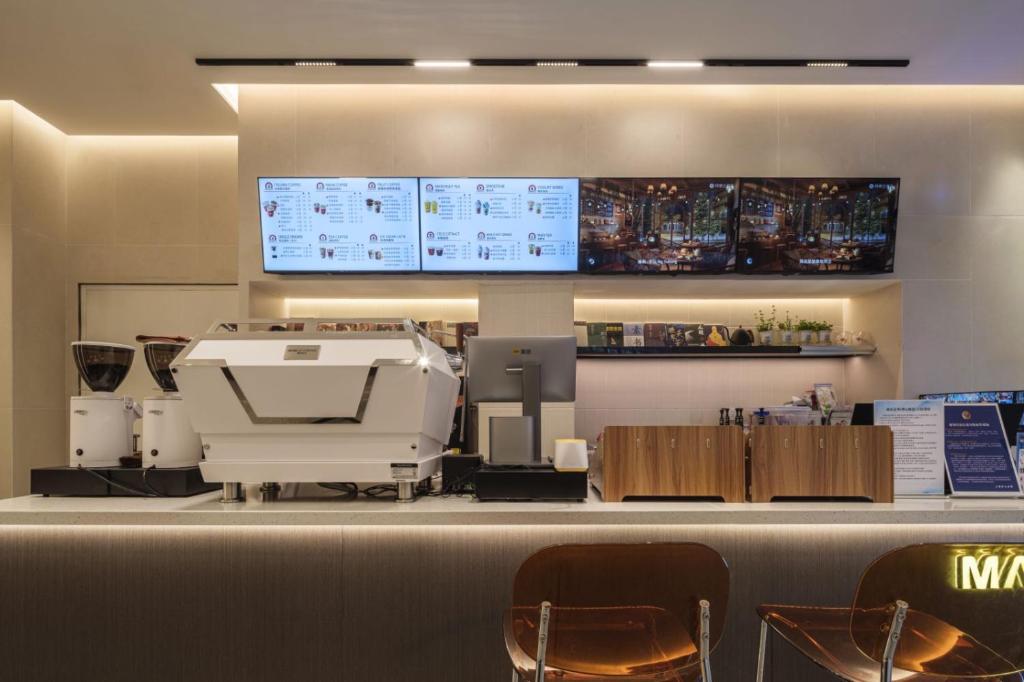 Příslušenství pro přípravu čaje a kávy v ubytování Captain 5 Youth Hotel-Shanghai Laoshan Road Branch