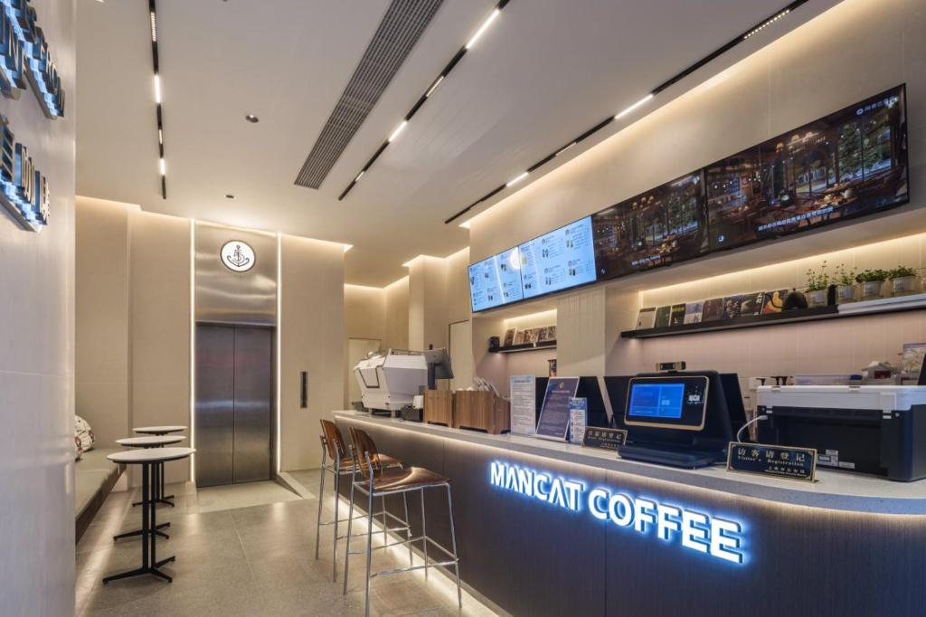 Příslušenství pro přípravu čaje a kávy v ubytování Captain 5 Youth Hotel-Shanghai Laoshan Road Branch