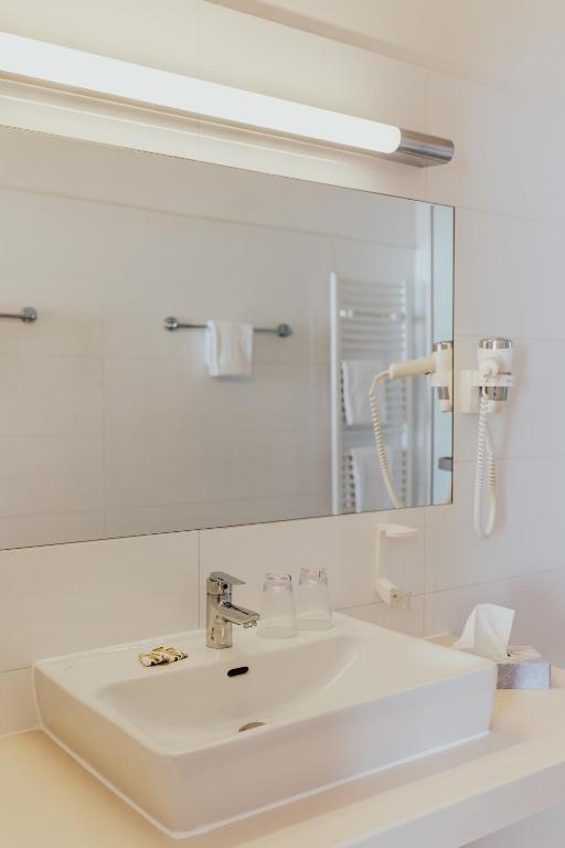 Kúpeľňa v ubytovaní Hotel Sporer