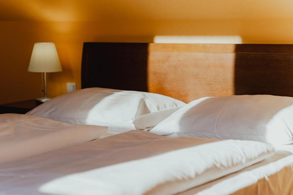 Posteľ alebo postele v izbe v ubytovaní Hotel Sporer