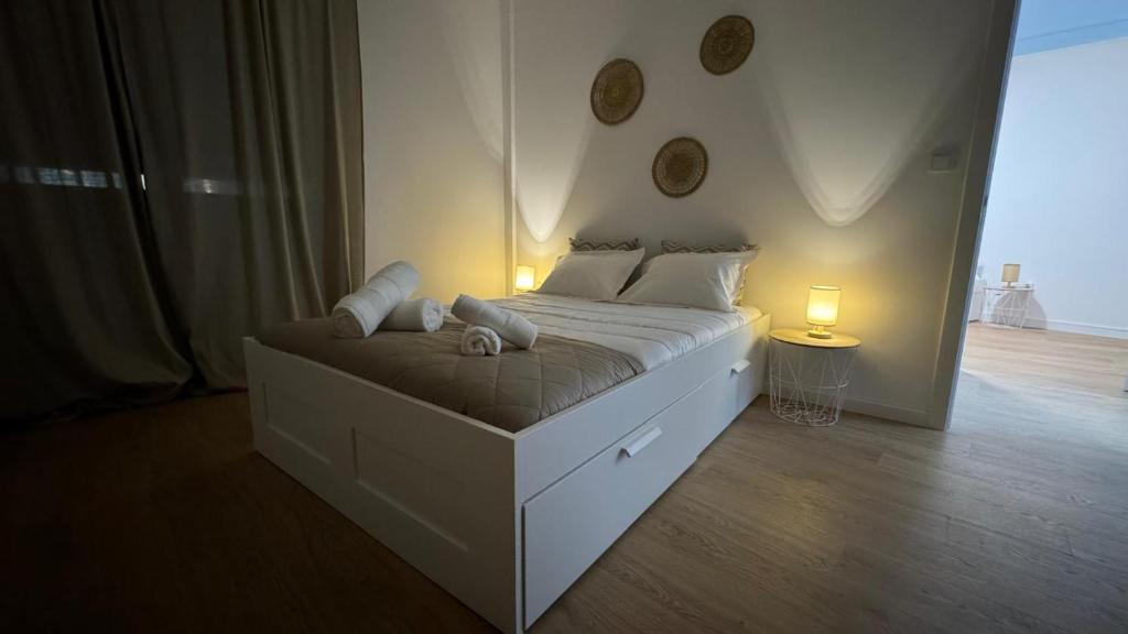 Letto o letti in una camera di Chalé do Tejo