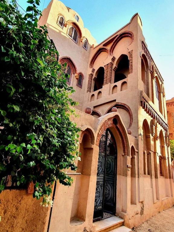 a building with a gate in front of it at Villa Rosamund in Luxor