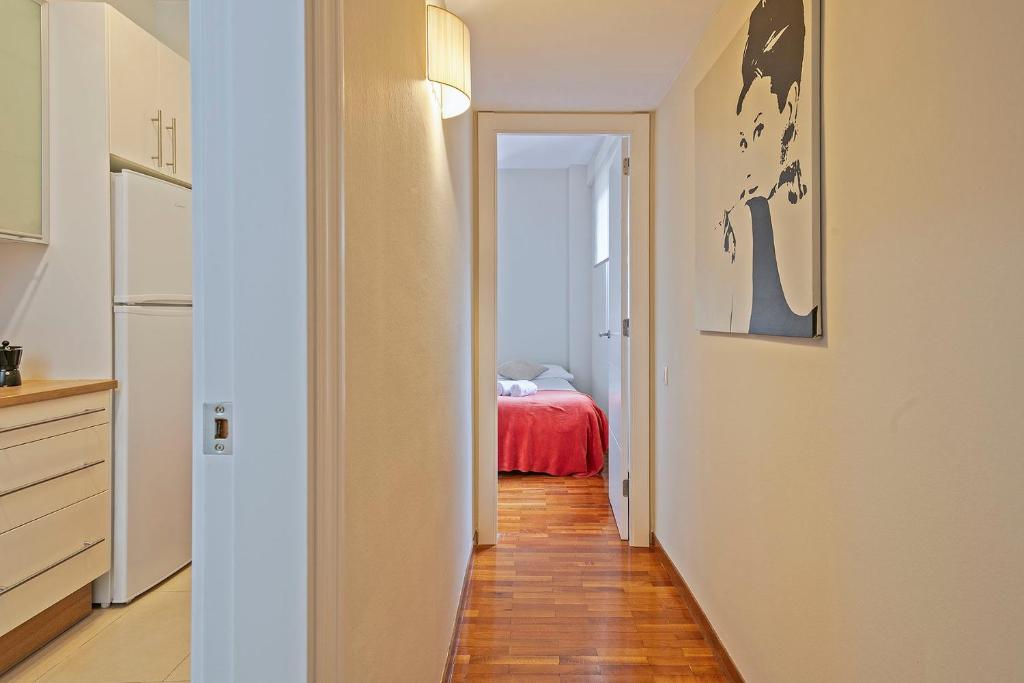 Postel nebo postele na pokoji v ubytování Sarria Attic