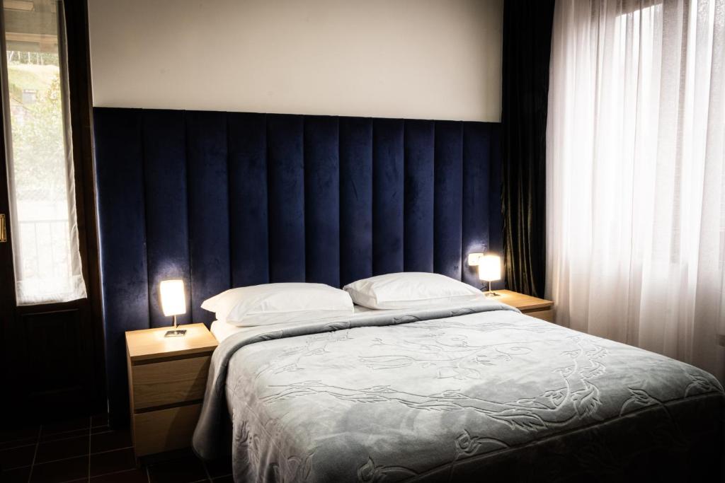 Postel nebo postele na pokoji v ubytování Hotel Sonenga