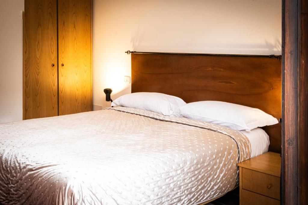 Postel nebo postele na pokoji v ubytování Hotel Sonenga