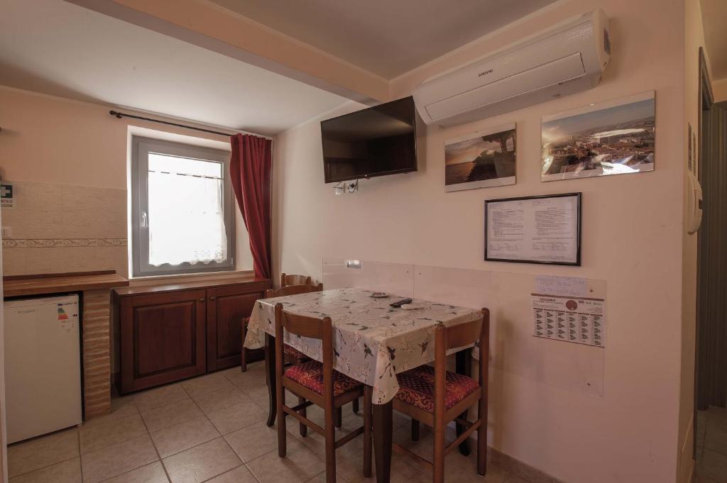 Kuchyň nebo kuchyňský kout v ubytování Apartment Nonna Delia