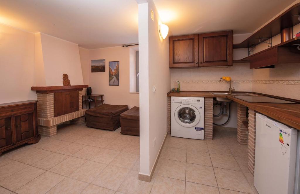 Kuchyň nebo kuchyňský kout v ubytování Apartment Nonna Delia