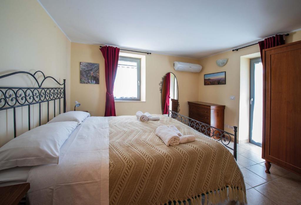 Postel nebo postele na pokoji v ubytování Apartment Nonna Delia