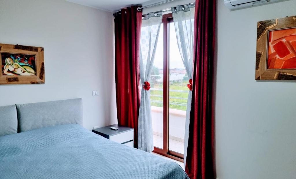 Postel nebo postele na pokoji v ubytování B&B Tavernese Case per ferie