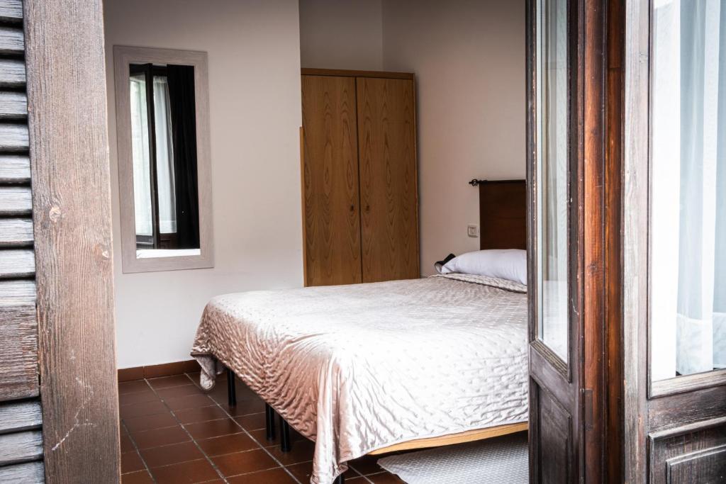 Postel nebo postele na pokoji v ubytování Hotel Sonenga