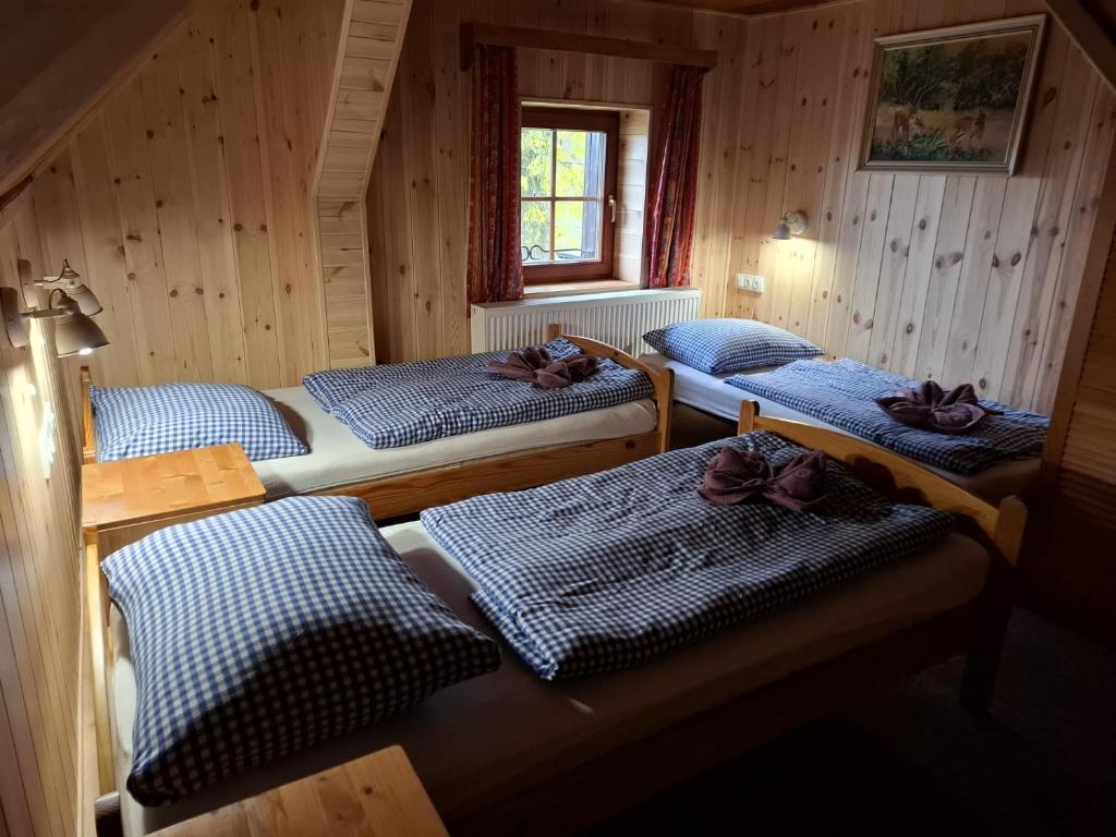 Postel nebo postele na pokoji v ubytování Chata Severka s Wellness
