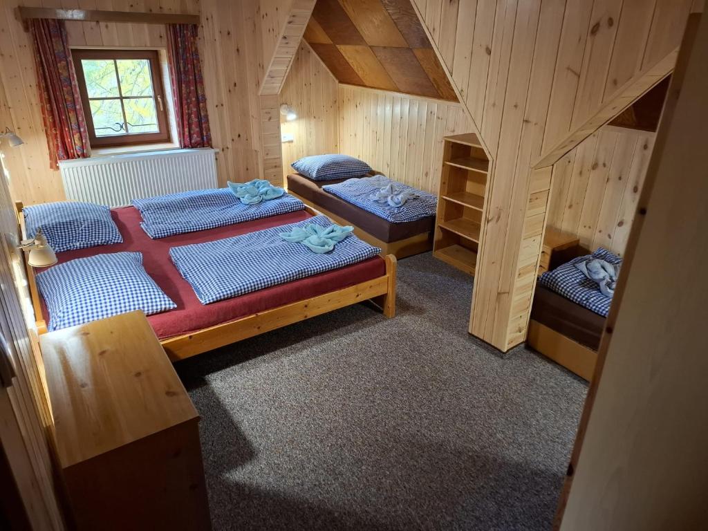 Postel nebo postele na pokoji v ubytování Chata Severka s Wellness