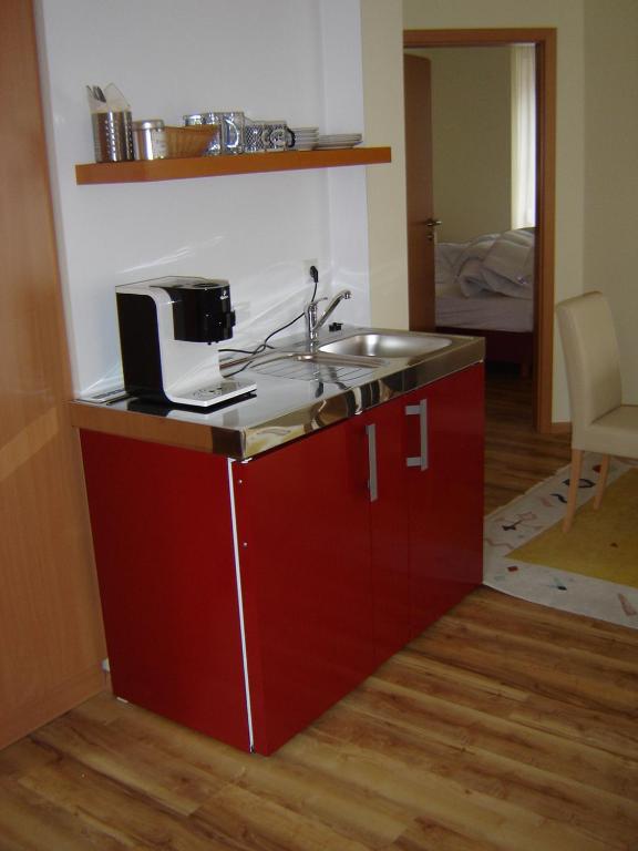 Kuchyň nebo kuchyňský kout v ubytování Gasthaus Schützen