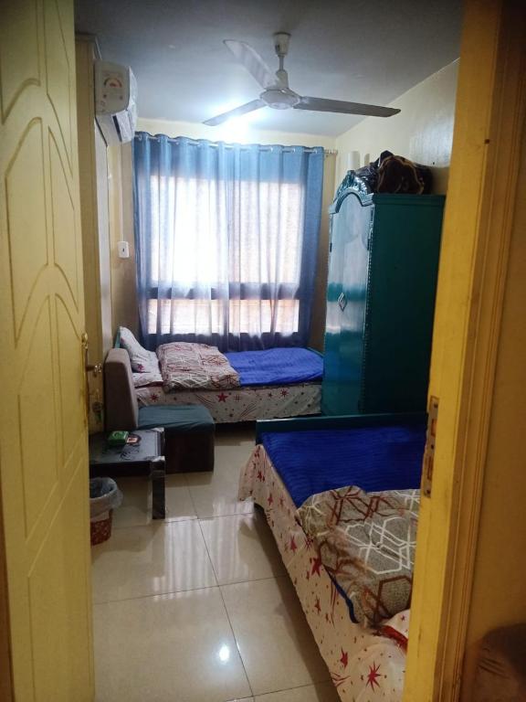 Postel nebo postele na pokoji v ubytování Sun Hostel