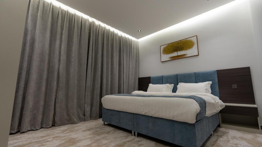 Katil atau katil-katil dalam bilik di فندق قمم بارك Qimam Park Hotel 9